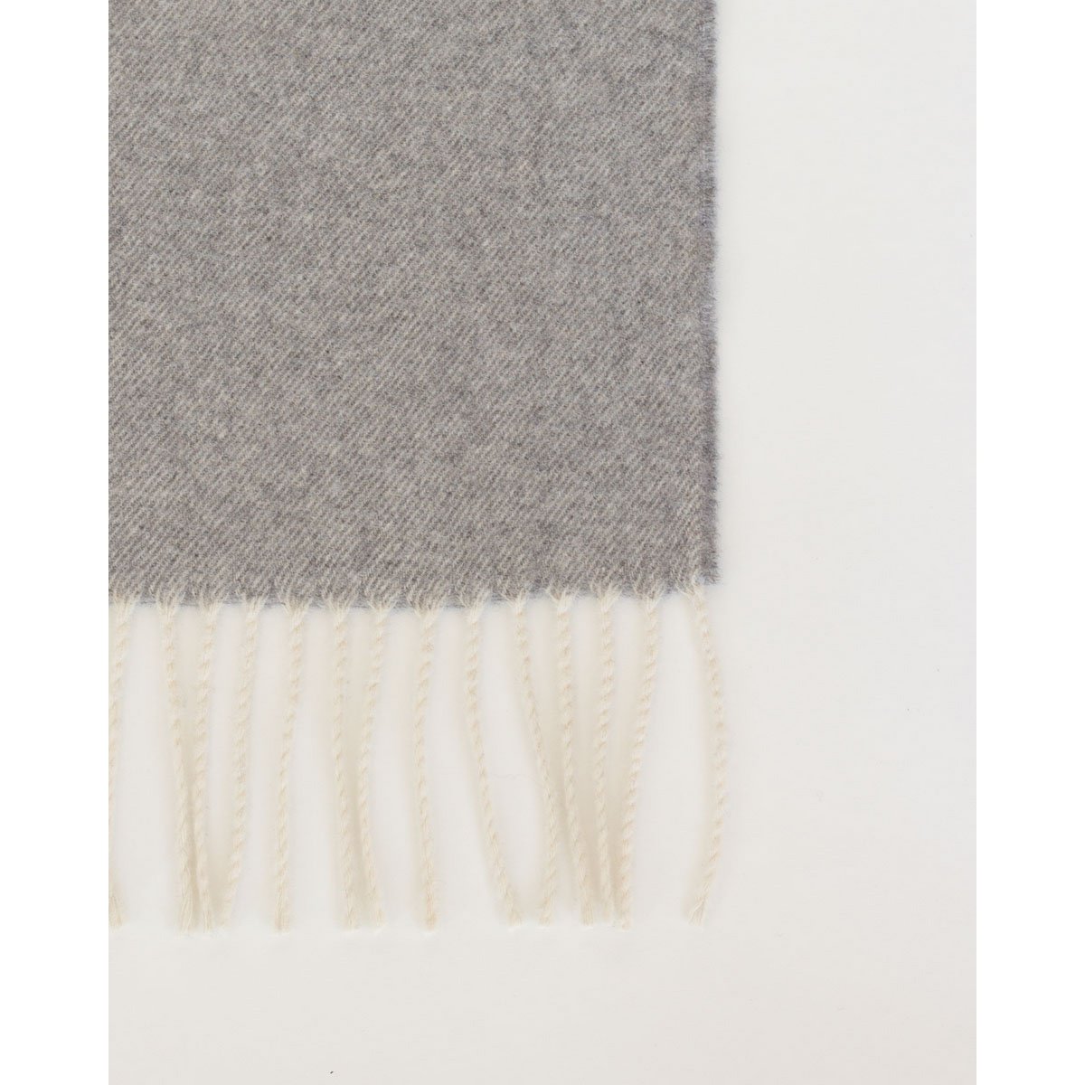 Gray and white striped scarf on a light gray background