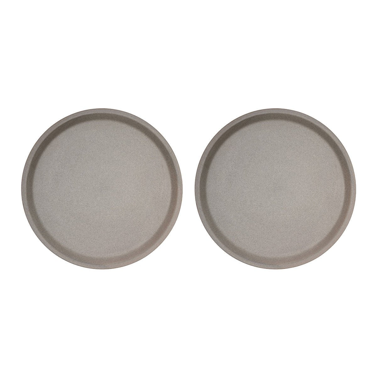 Two round grey dinner plate on a white background