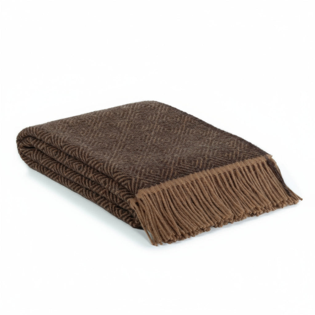 Brown woven blanket with fringes on a white background