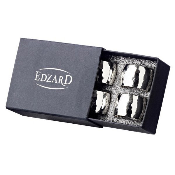 Set of silver napkin holders in a 'Edzard' branded box on a white background