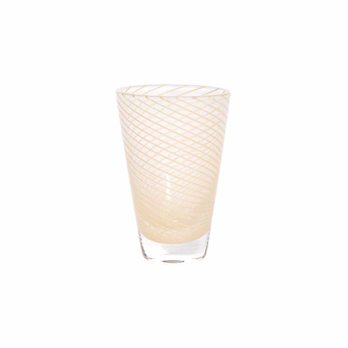 Glass with wavy swirl pattern on a white background