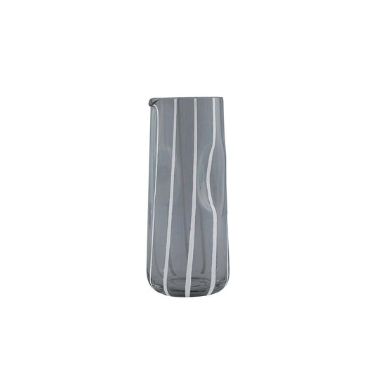 Gray glass carafe with white stripes on a white background