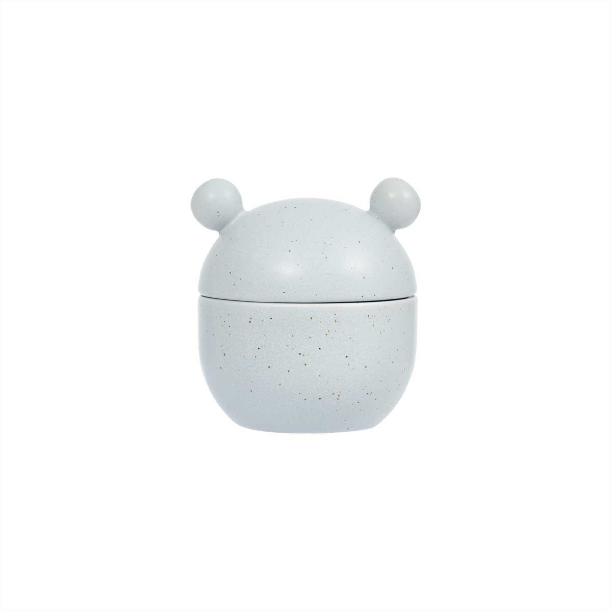 Speckled gray container with a lid on a white background