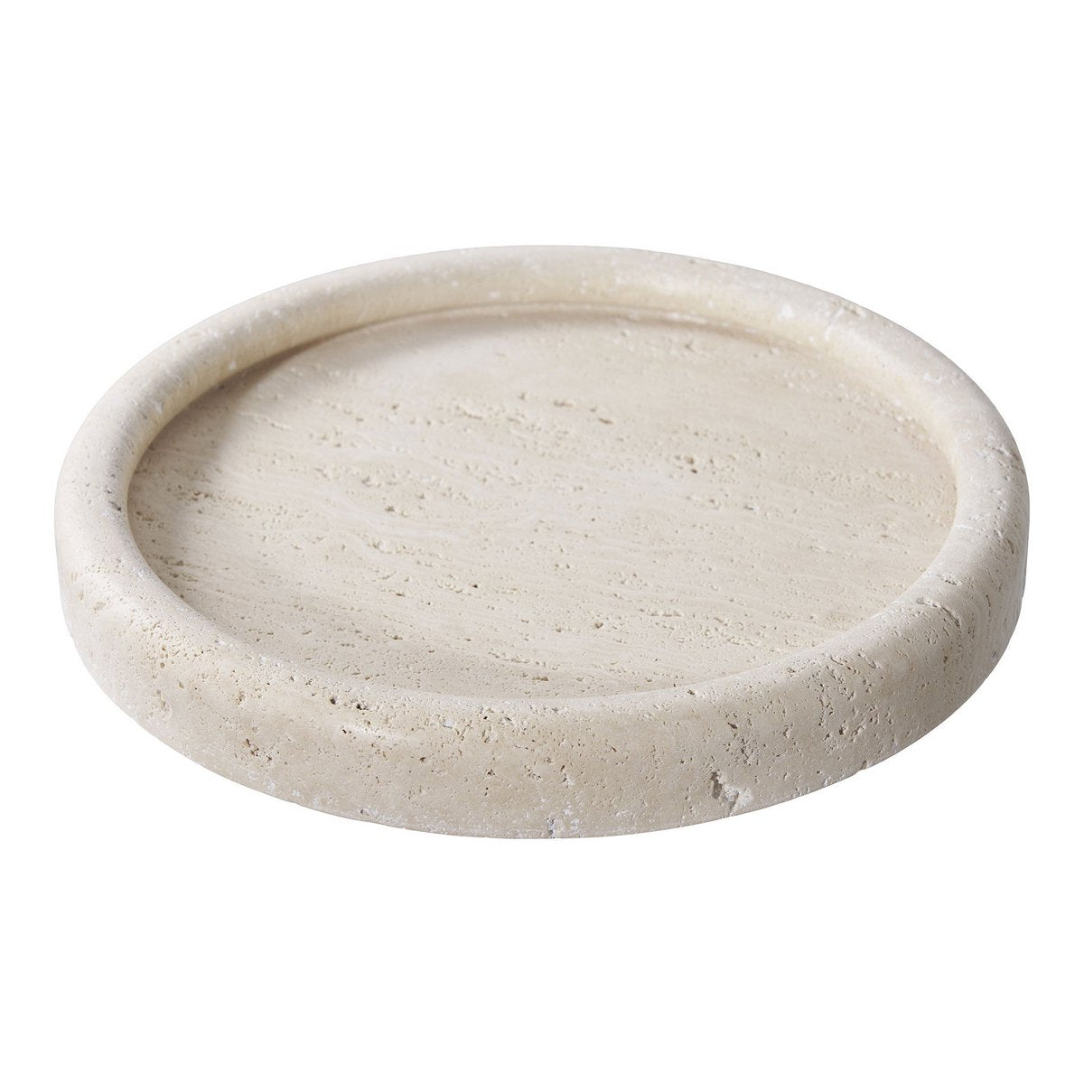 Round beige travertine stone dish on a white background