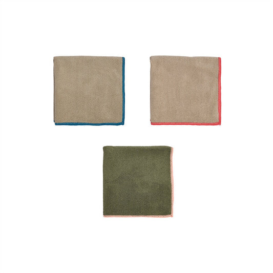Three woven fabric microfibre dish clothes in different colours on a white background