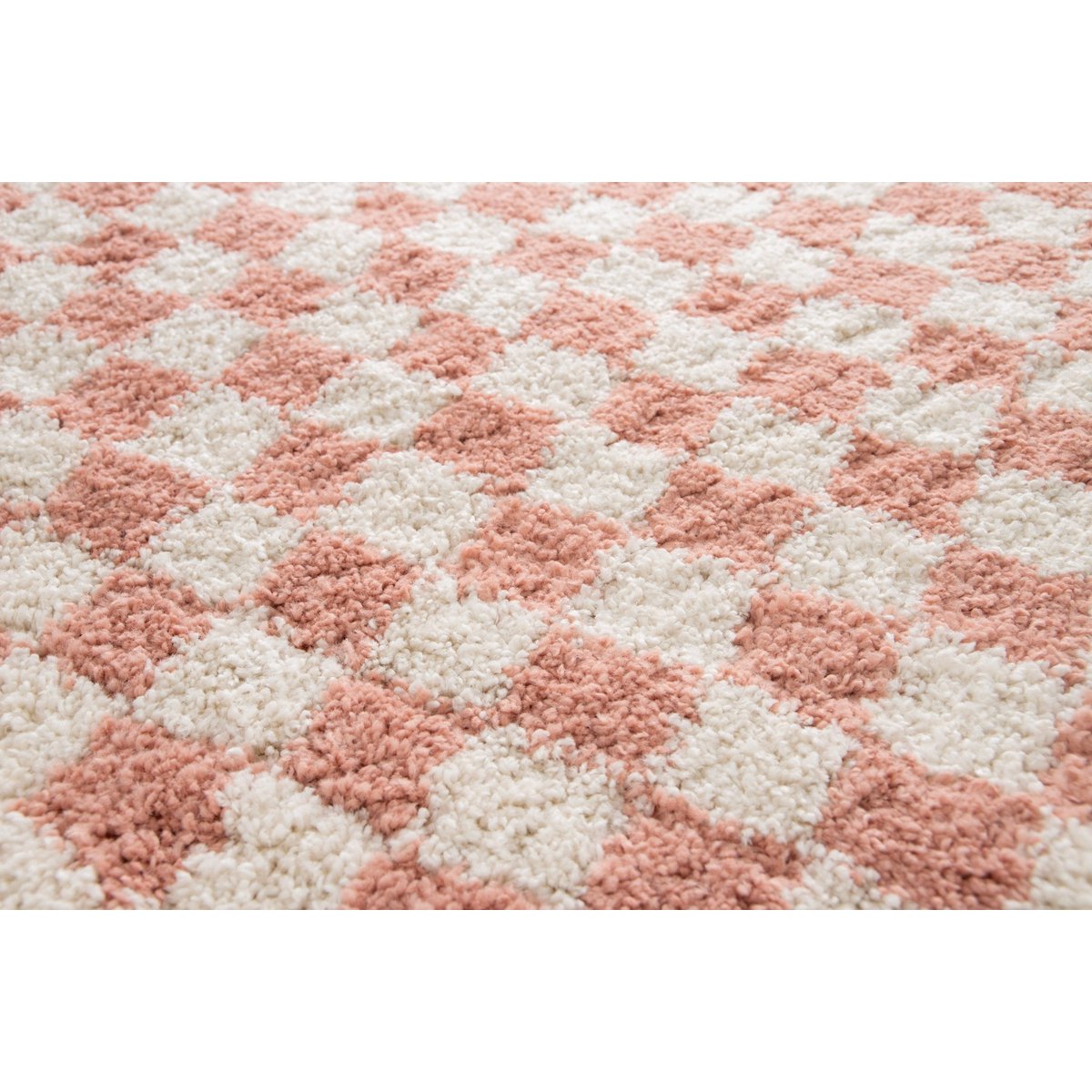 Pink and white checkered patterned rug