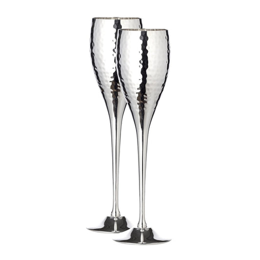 Two silver champagne flutes with a textured design on a white background