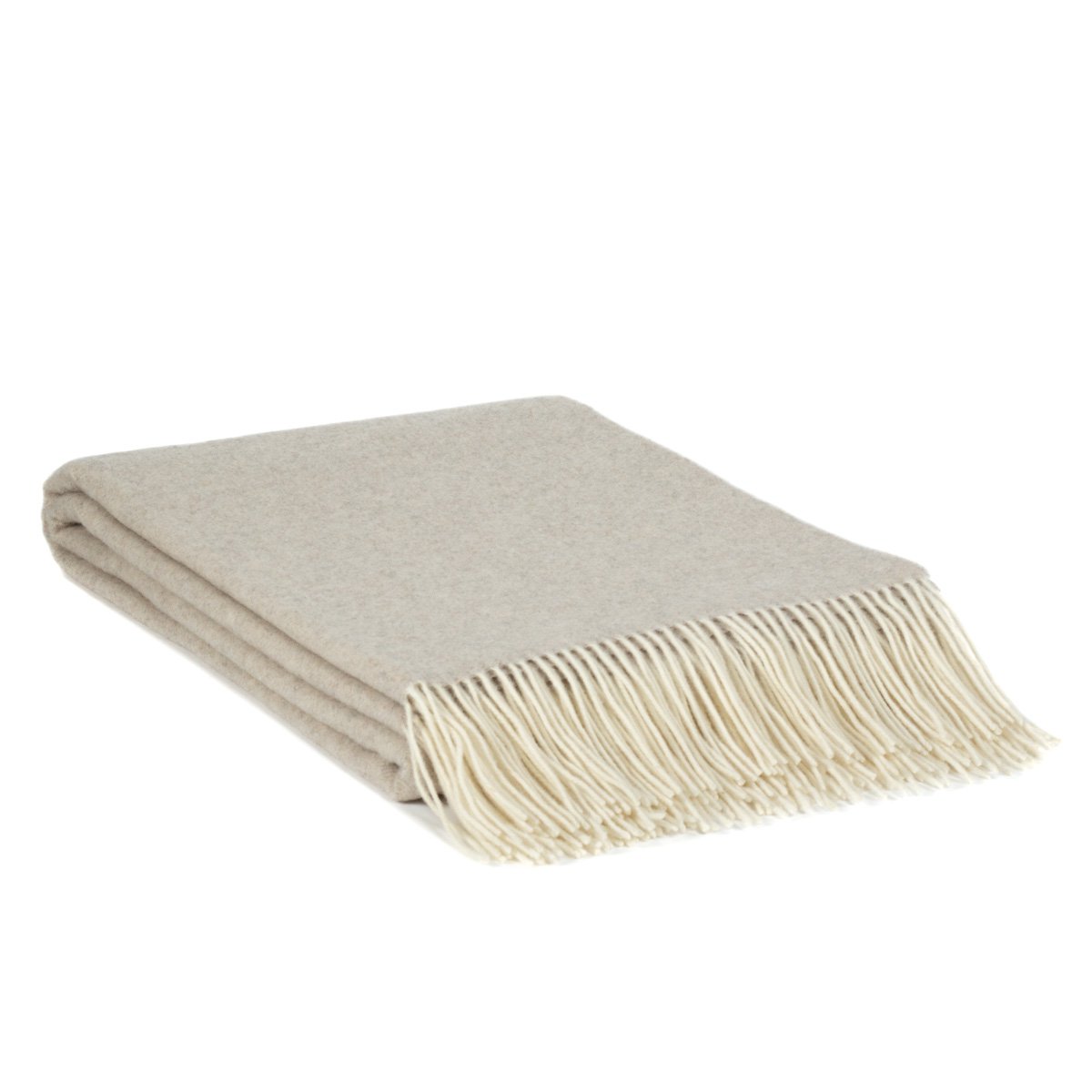 Beige throw blanket with fringes on a white background