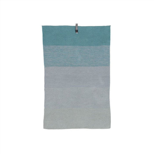Gradient blue kitchen towel on a white background
