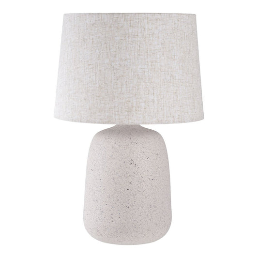 Table lamp with a textured white base and light gray shade on a white background