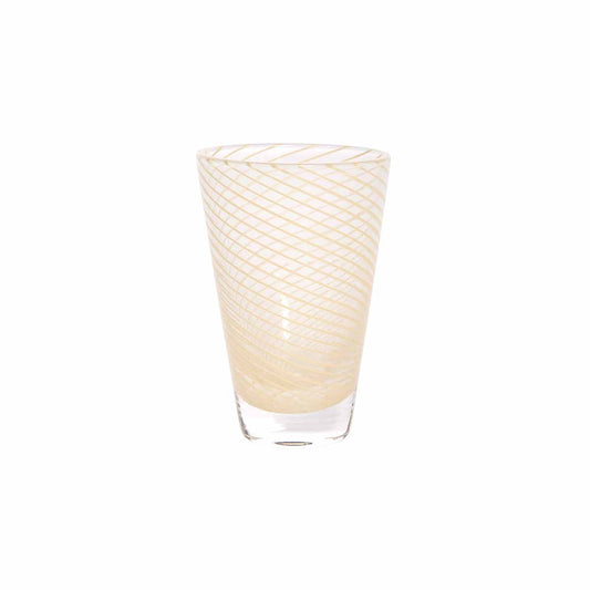 Glass with wavy swirl pattern on a white background
