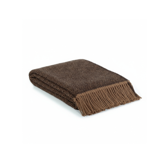 Folded brown blanket with fringes on a white background