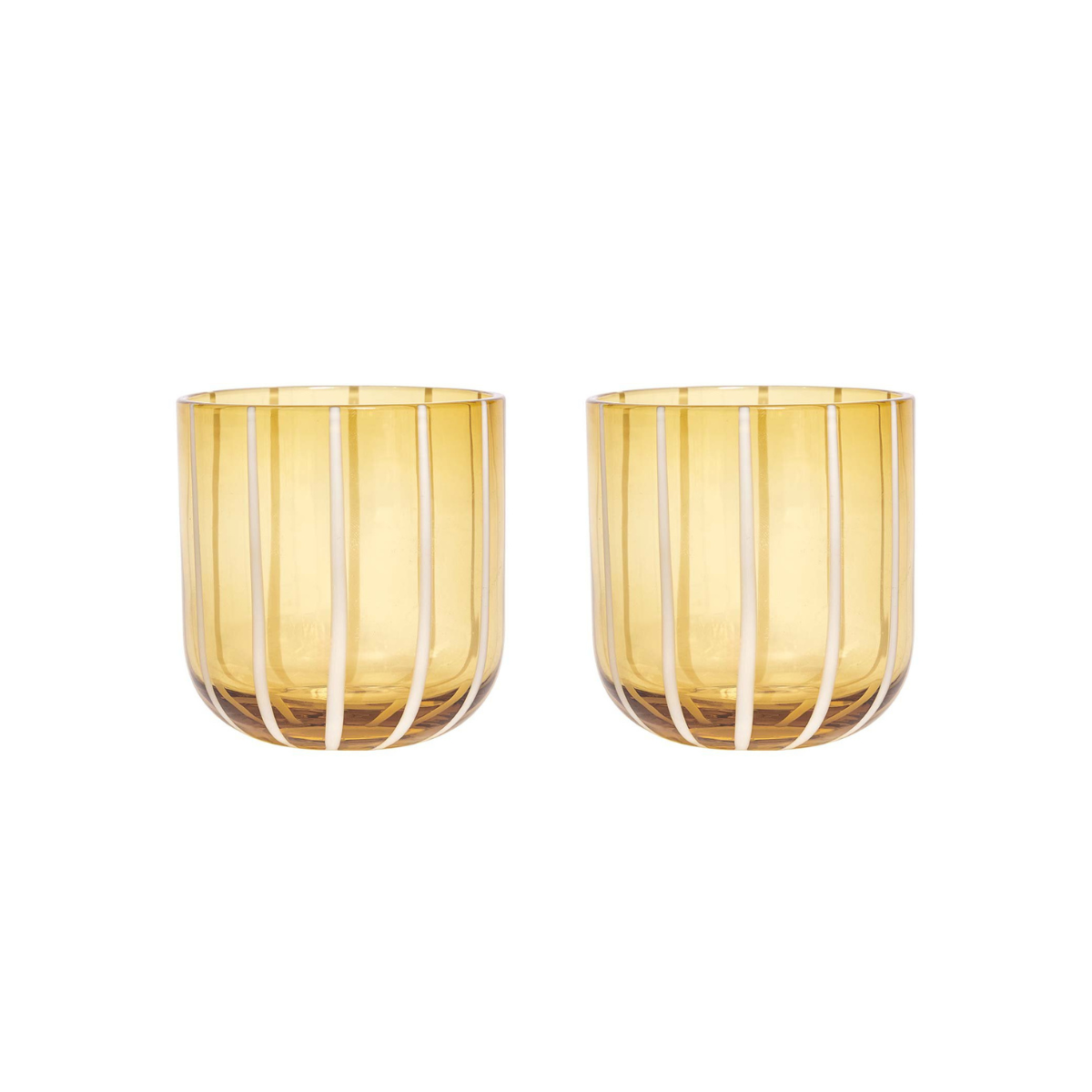 Two amber glass tumblers with white wire designs on a white background
