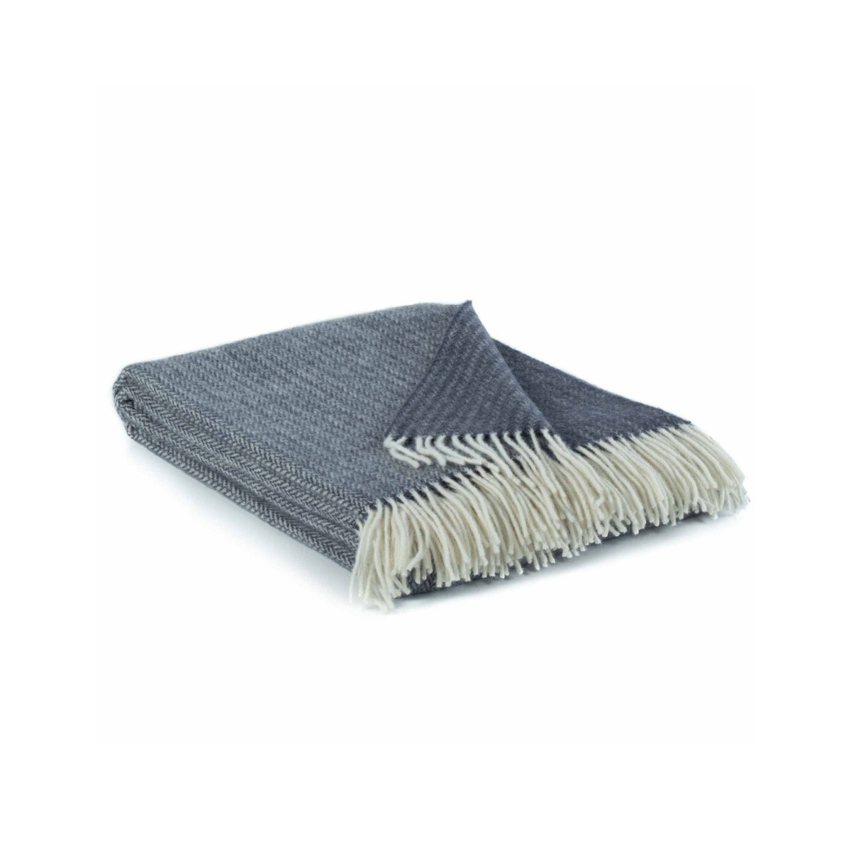 Folded blue and white blanket on a white background